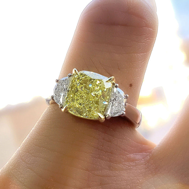 Canary Fancy Yellow Cushion and Half Moons Diamond Ring on Finger