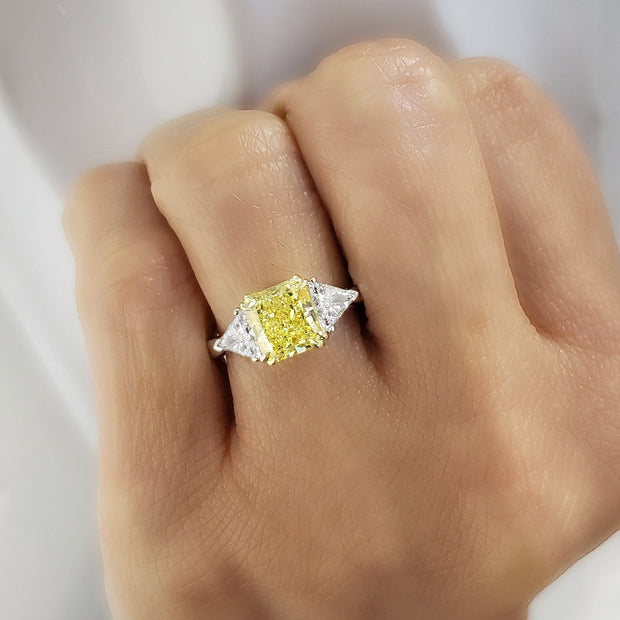 Yellow 3Stone Radiant Cut Diamond Ring on Hand