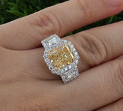3.70 Ct. Fancy Yellow Radiant Cut Halo Split Shank Engagement Ring SI1 GIA Certified