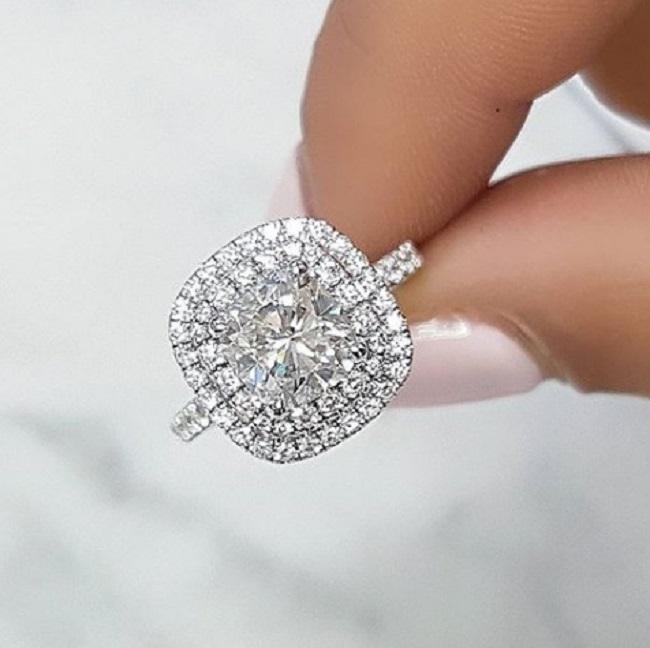 Cushion cut double halo engagement rings