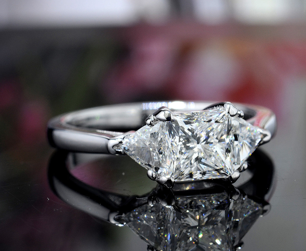 3 stone princess cut engagement ring with trillions