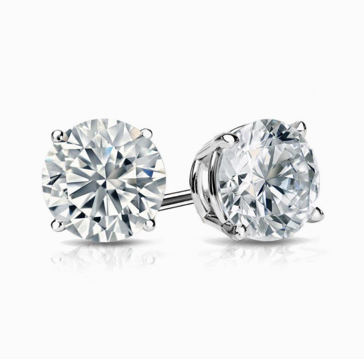 Round cut diamond stud earrings