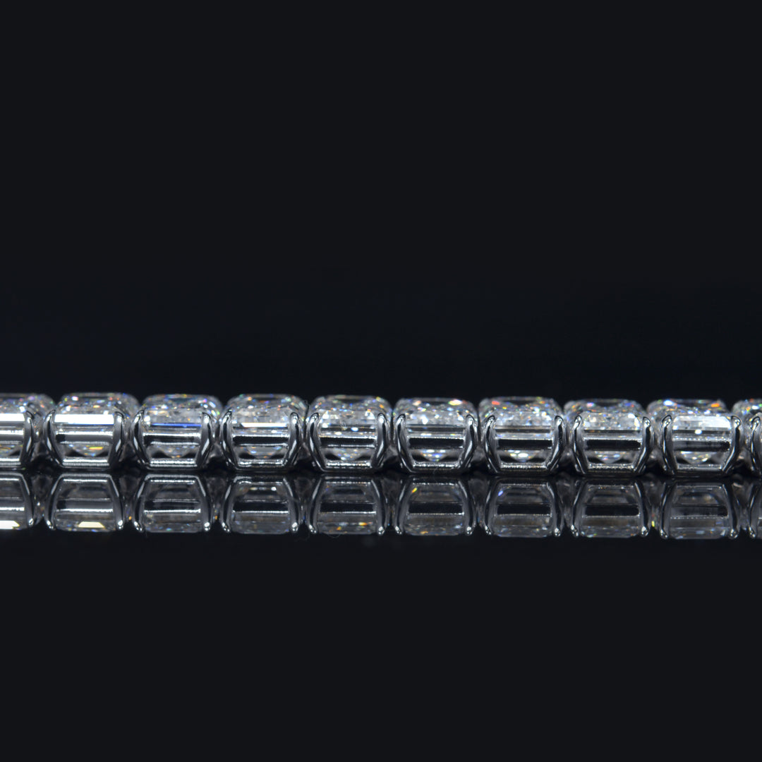Emerald cut diamond tennis bracelet in white gold side view