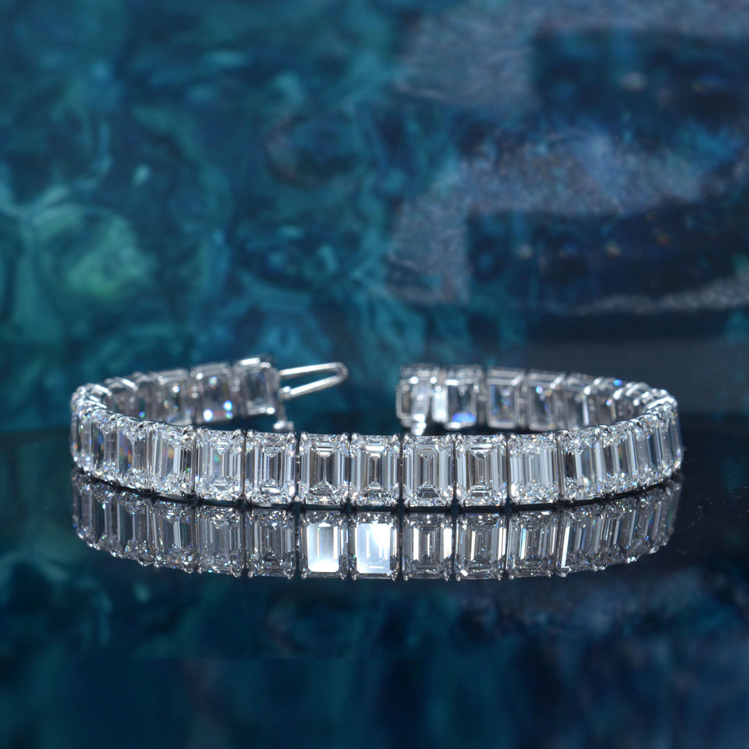 Emerald cut diamond tennis bracelet in white gold
