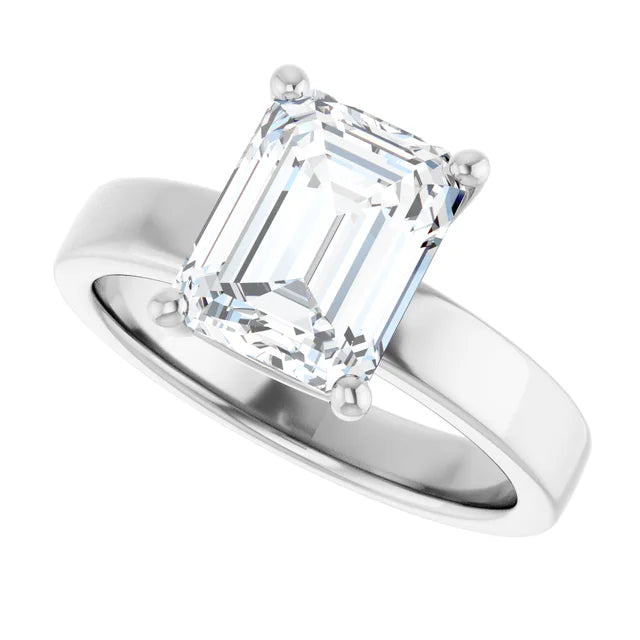Emerald cut diamond solitaire engagement ring in white gold