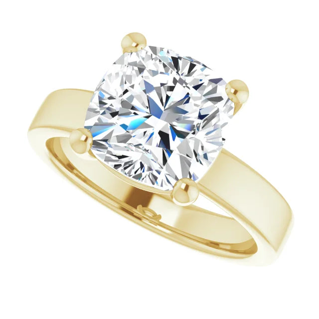 Cushion cut diamond solitaire engagement ring in yellow gold