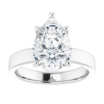 Pear cut solitaire engagement ring in white gold