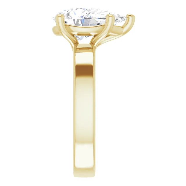 Pear Cut Solitaire Engagement Ring in yellow gold side view