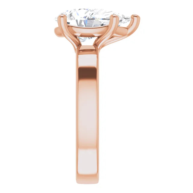 Pear Cut Solitaire Engagement Ring in rose gold side view