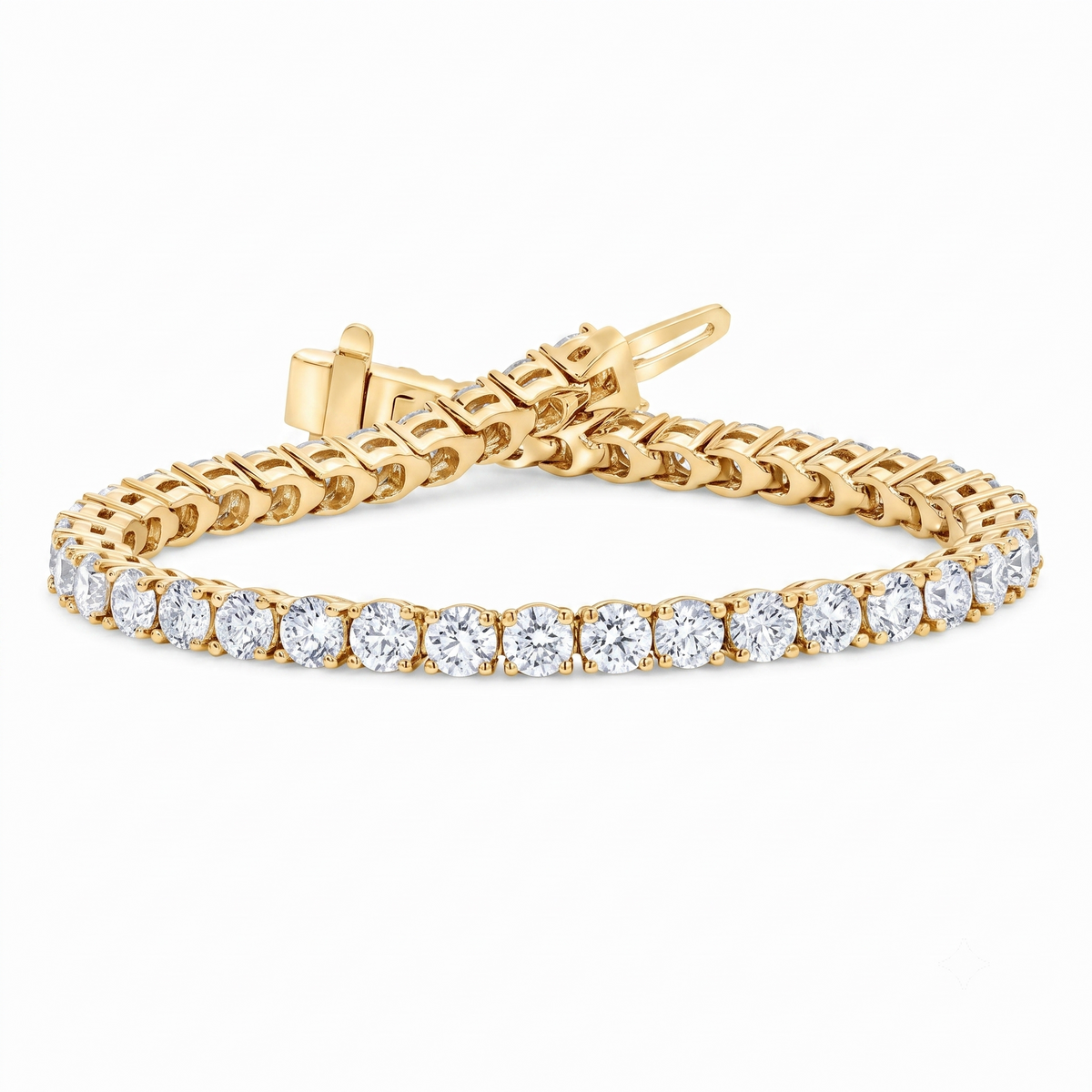 A yellow gold tennis bracelet featuring a continuous row of round cut clear gemstones, displayed on a clean white background