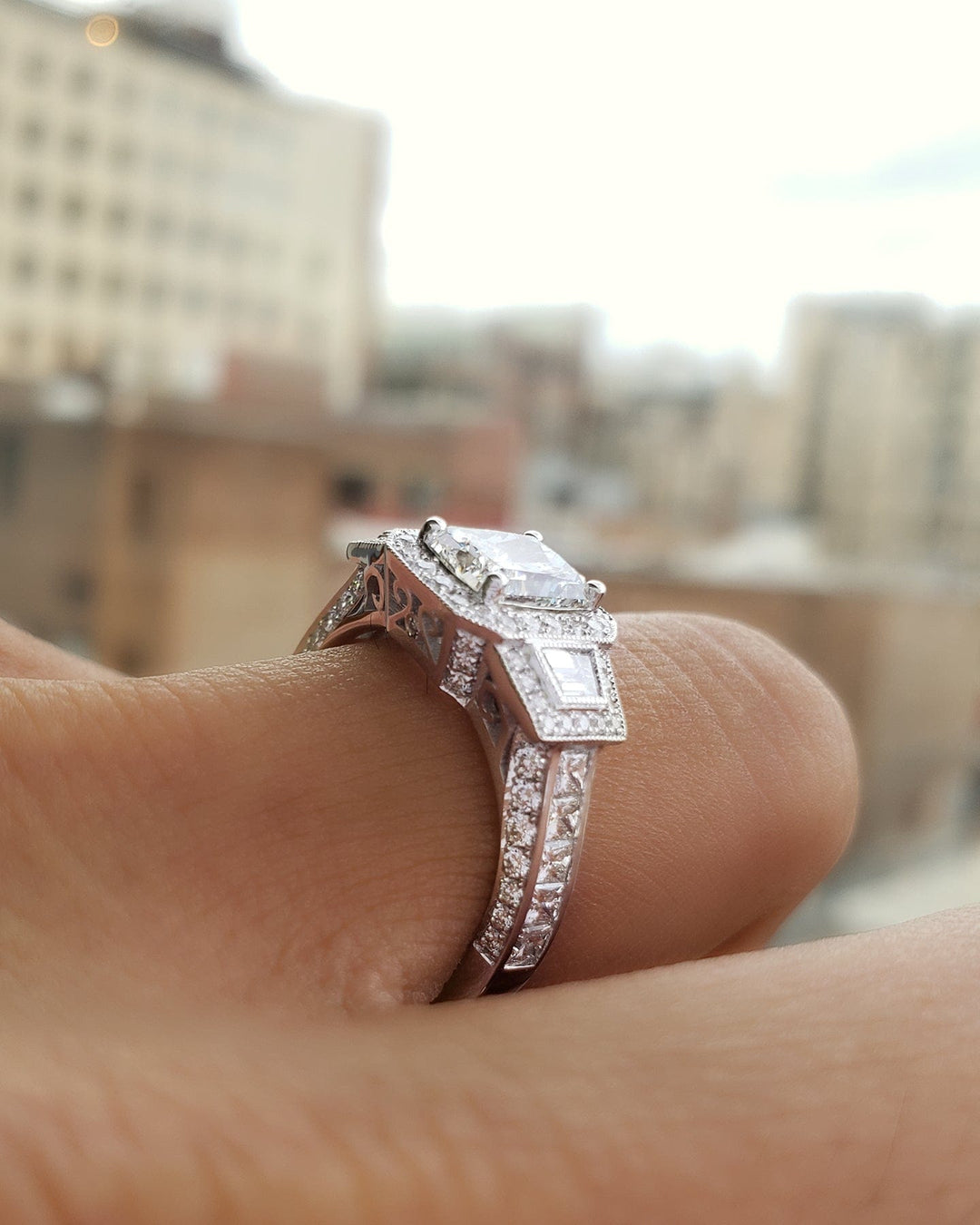 Halo Emerald Cut Princess & Trapezoids Diamond Ring on finger