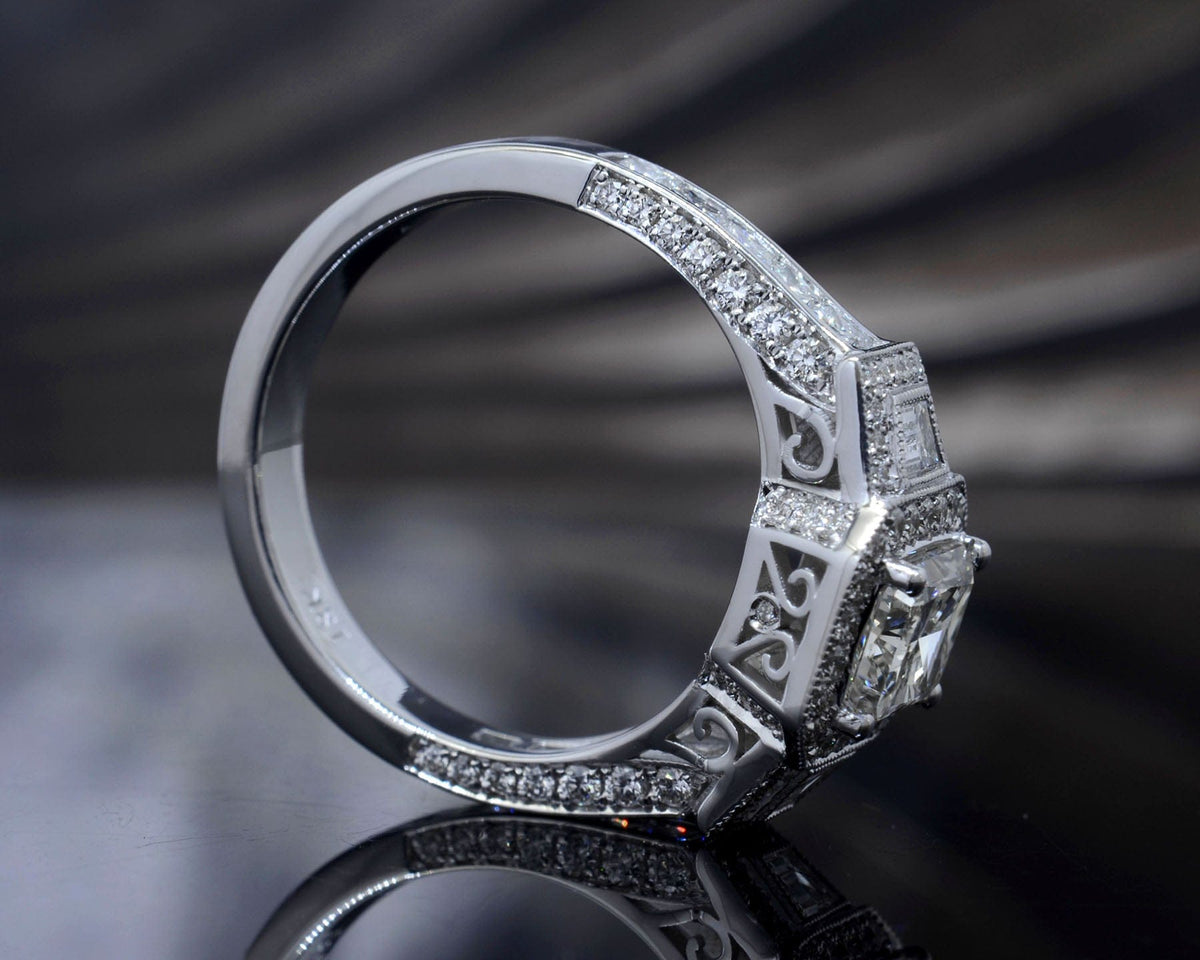 Halo emerald cut princess & trapezoids diamond ring side view