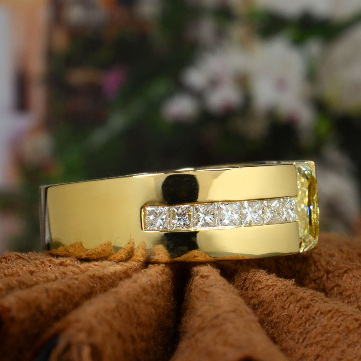 Lab grown elongated radiant fancy intense yellow and princess diamond ring tension & channel set igi certified