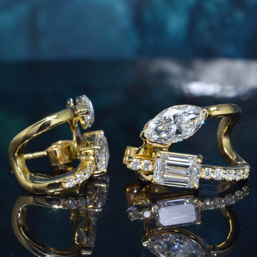 Emerald & Marquise Cut Two-Stone Earrings with Round Pave in yellow gold side & front view