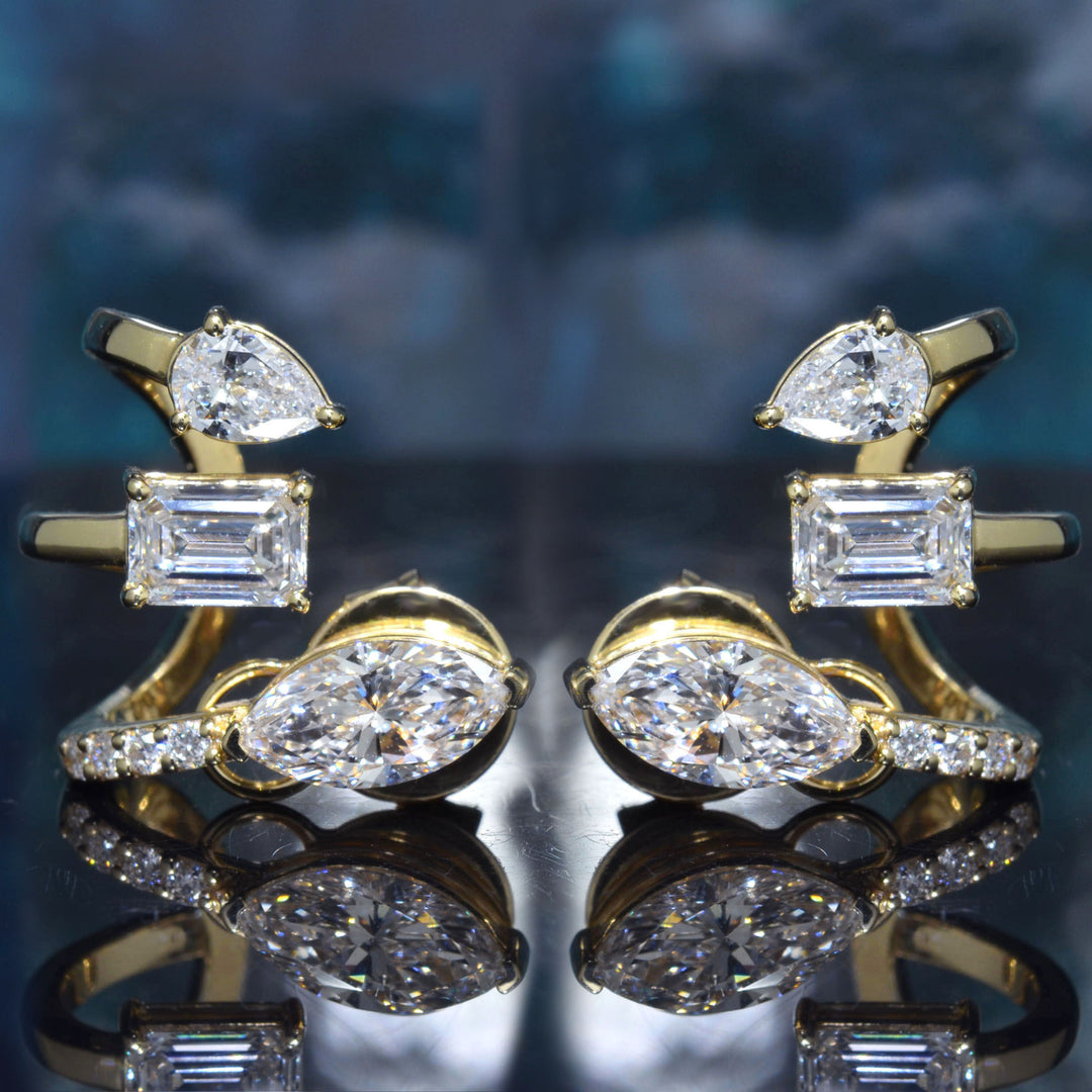 Multi-Shape Diamond Curved Crawler Earrings with Marquise, Emerald , Pear and pave Round cut in yellow gold front view