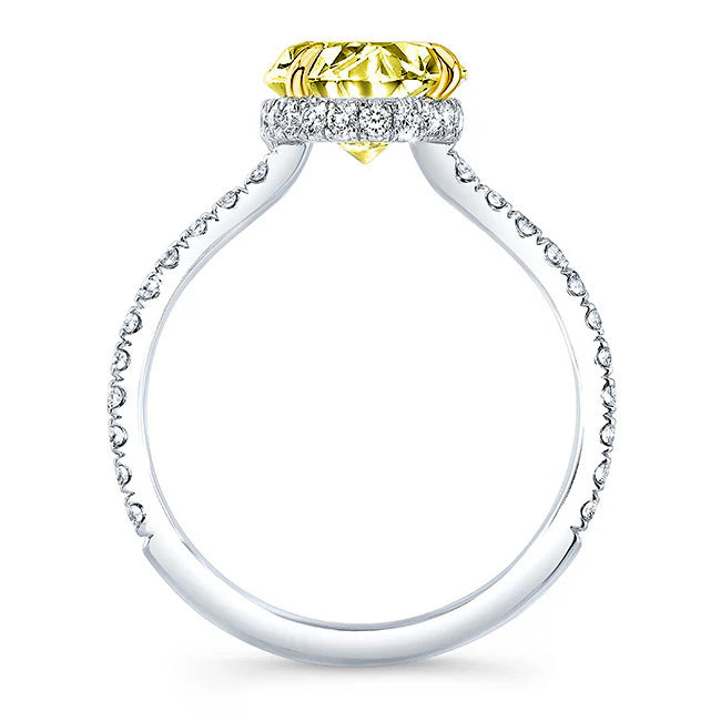 Oval Yellow center hidden halo ring with yellow gold prongs and white gold shank side profile