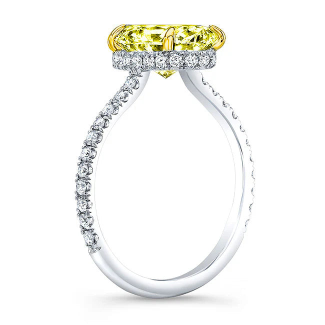Oval yellow center hidden halo ring with yellow gold prongs and white gold shank side profile