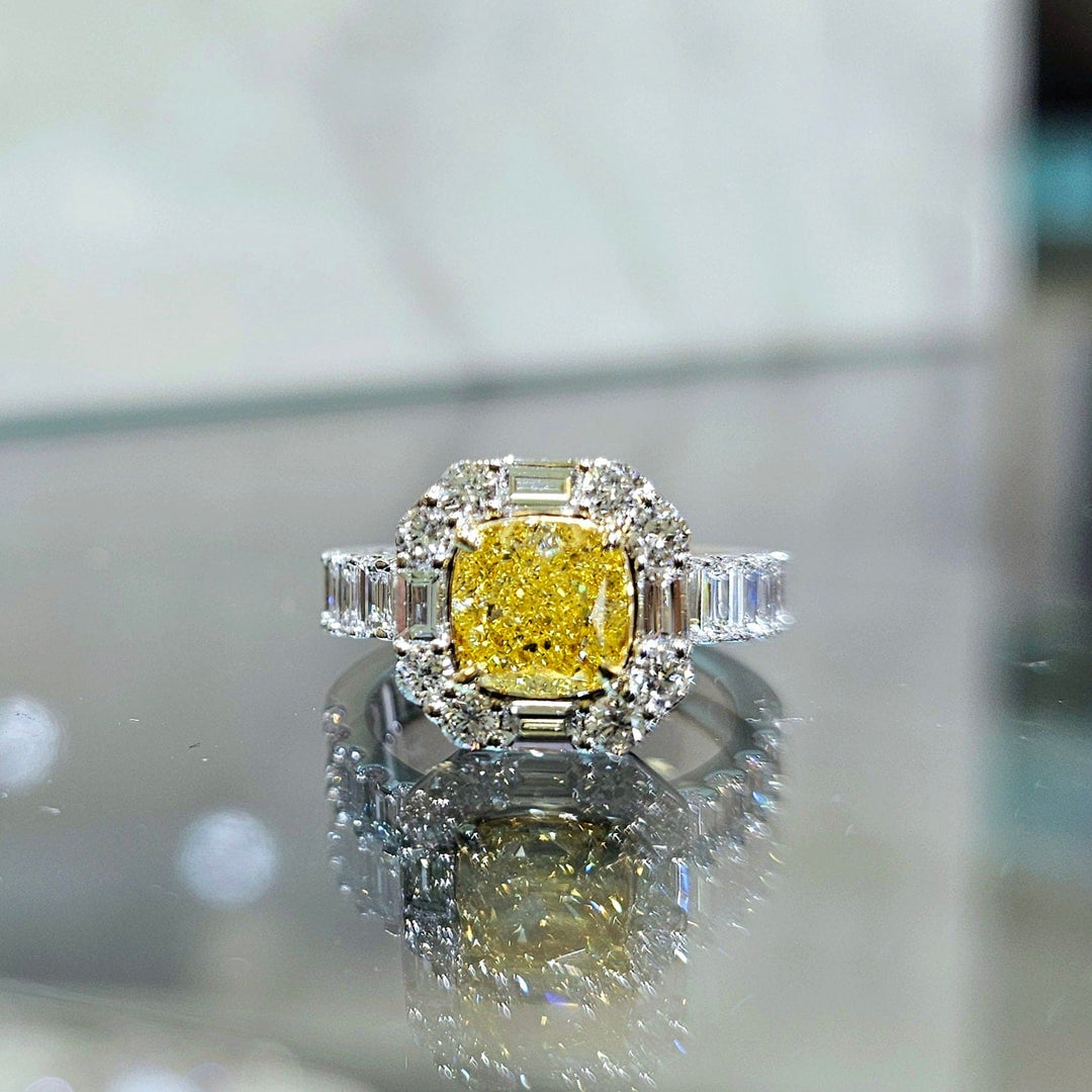 Cushion Yellow diamond with Halo baguette and Round cut Ring in white gold