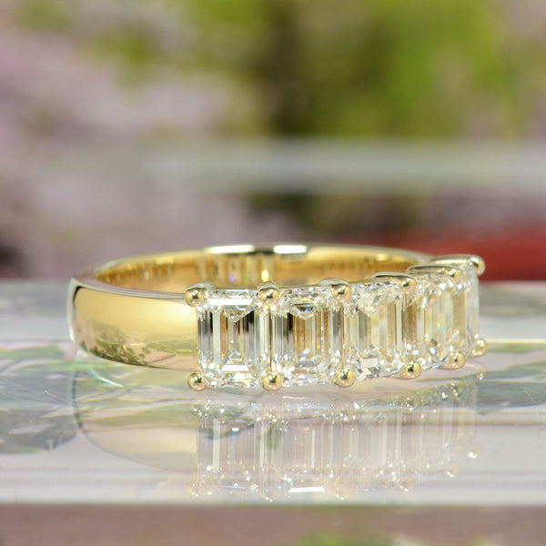 5 stone emerald cut yellow gold front view