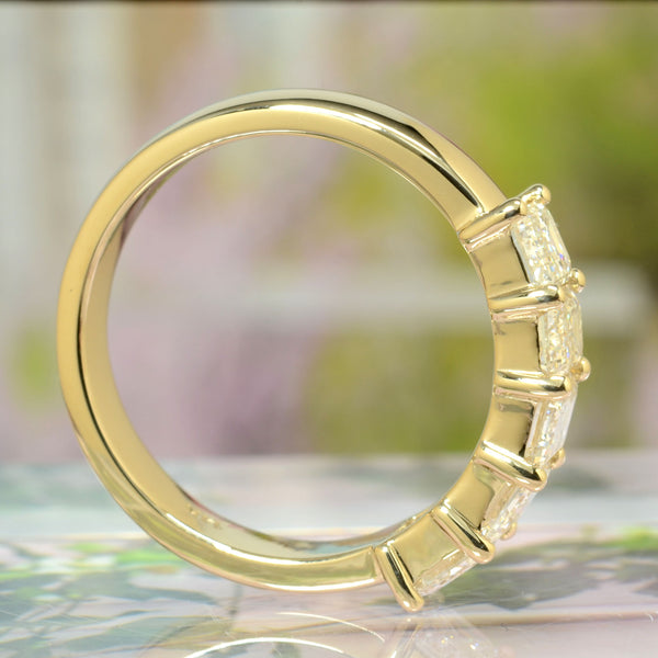 5 stone emerald cut yellow gold side view