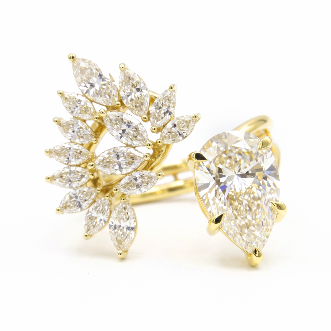 Pear Cut and Marquise Cluster Diamond Bypass Ring in yellow gold front view
