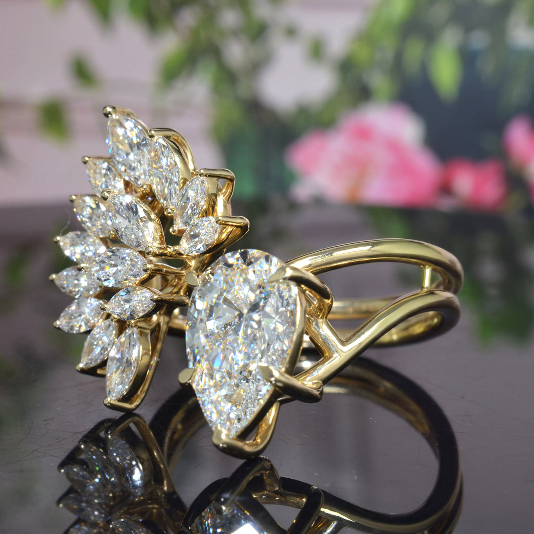 Pear Cut and Marquise Cluster Diamond Bypass Ring in yellow gold side angle view