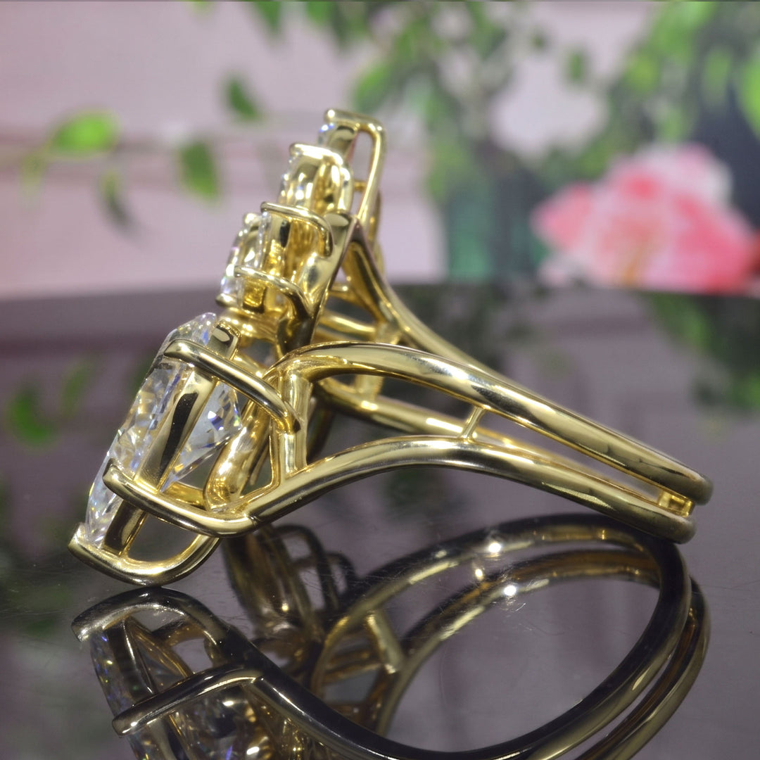 Pear Cut and Marquise Cluster Diamond Bypass Ring in yellow gold side view