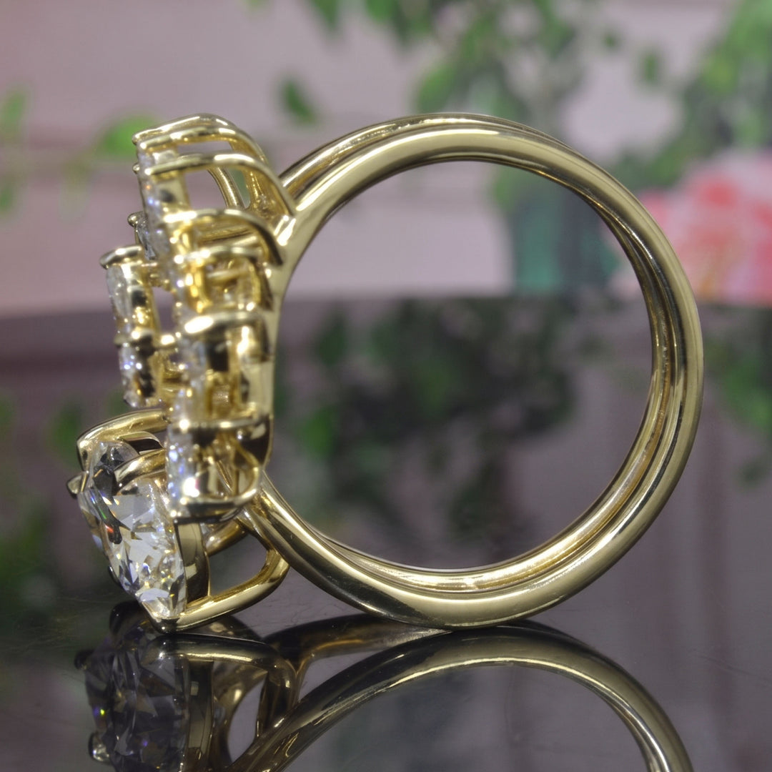 Pear Cut and Marquise Cluster Diamond Bypass Ring in yellow gold side profile