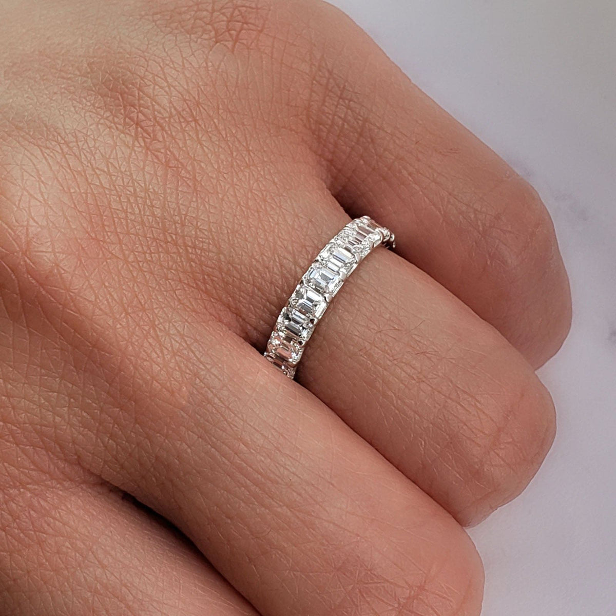 Low profile emerald cut eternity band f g color vs1 (2