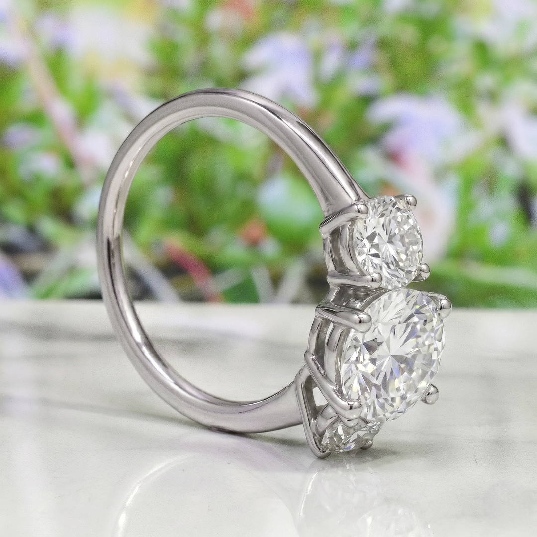 3 stone round cut diamond ring in white gold side view