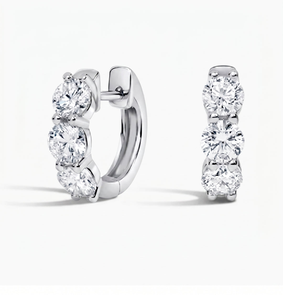 3-stone round cut hoop earrings in white gold side and front profile