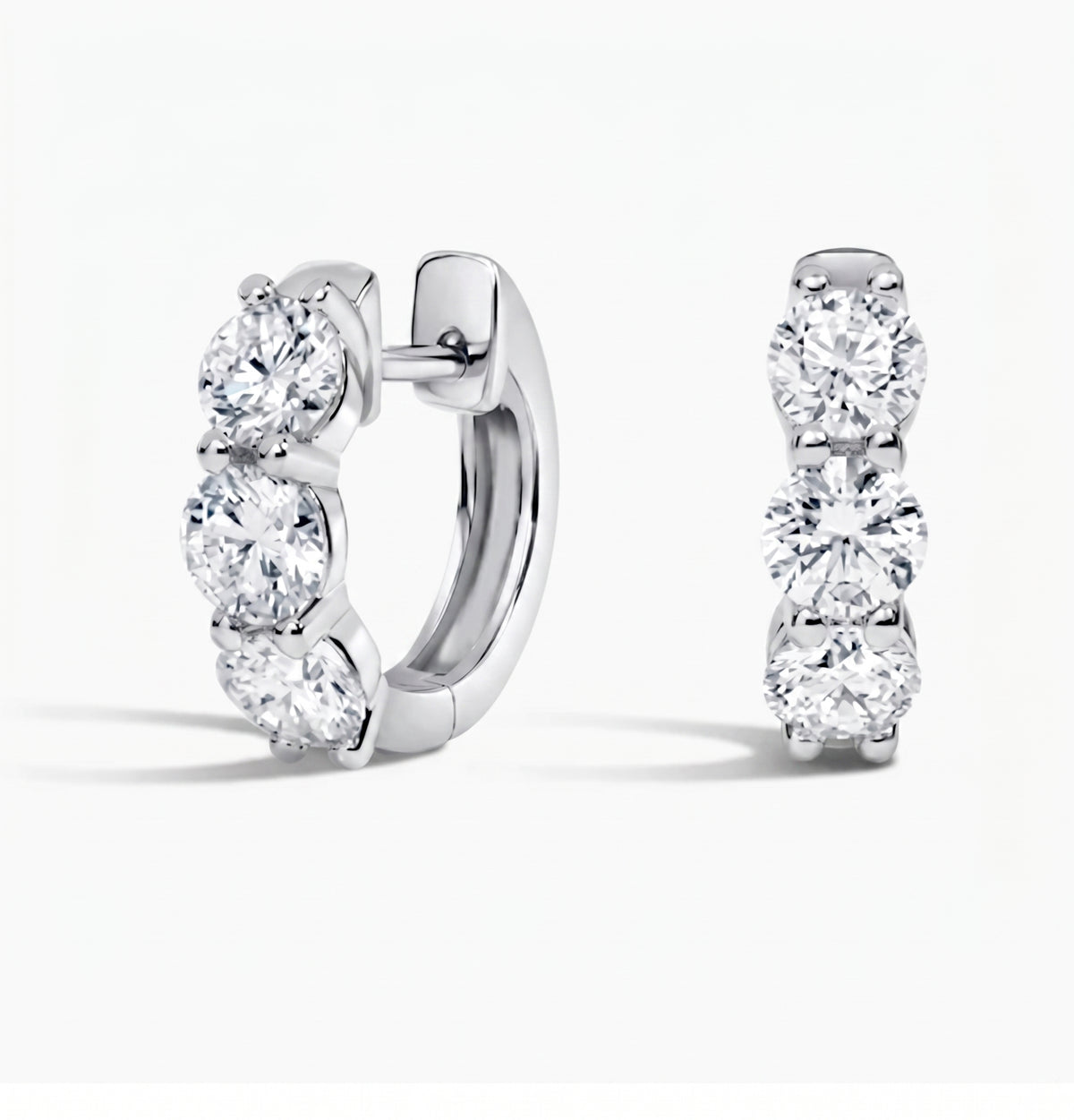 3 stone round cut hoop earrings in white gold side and front profile