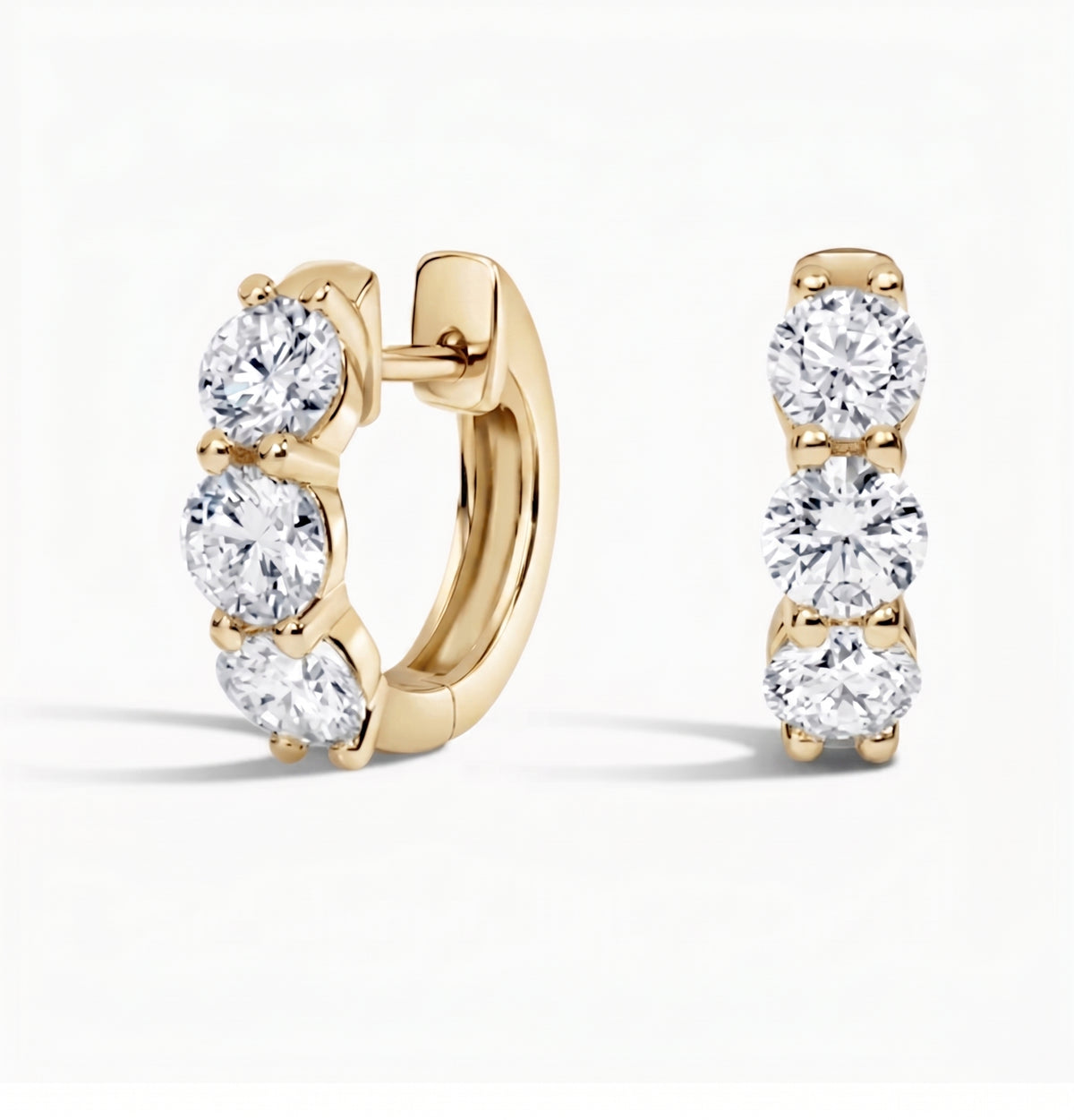 3 stone round cut hoop earrings in yellow gold side and front profile