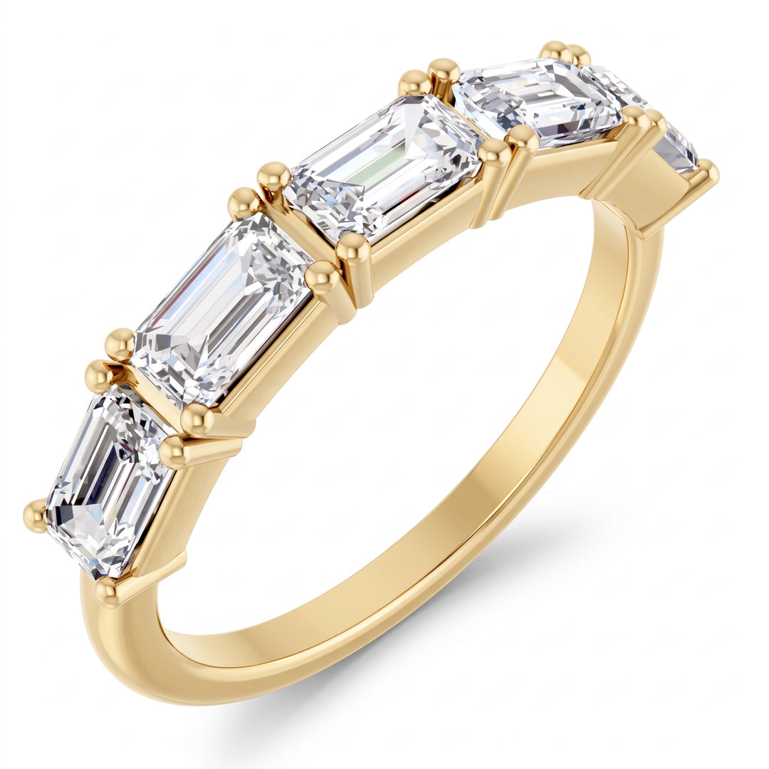 5 stone emerald cut east west diamond band yellow gold, shown on a clean white background.