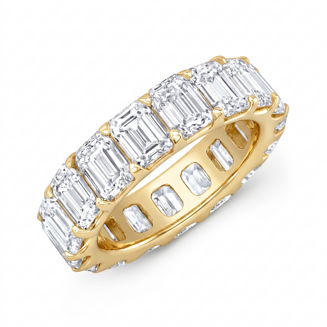 emerald cut eternity band low profile yellow gold