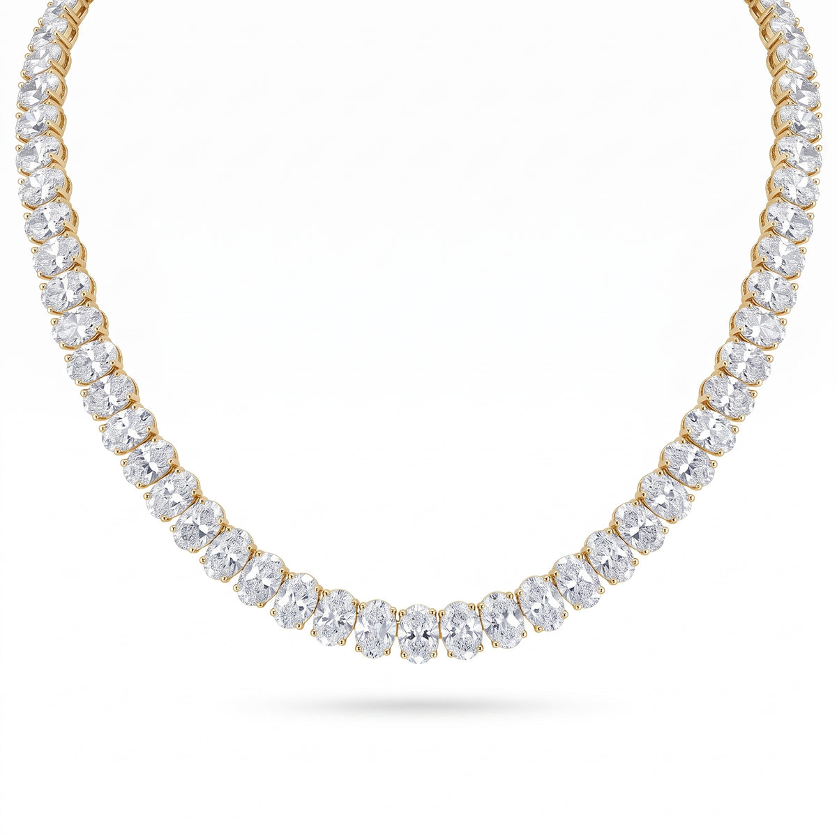 Oval cut tennis necklace yellow gold in white background