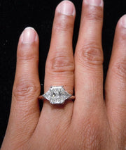 3 Stone Radiant Cut Engagement Rings on Hand