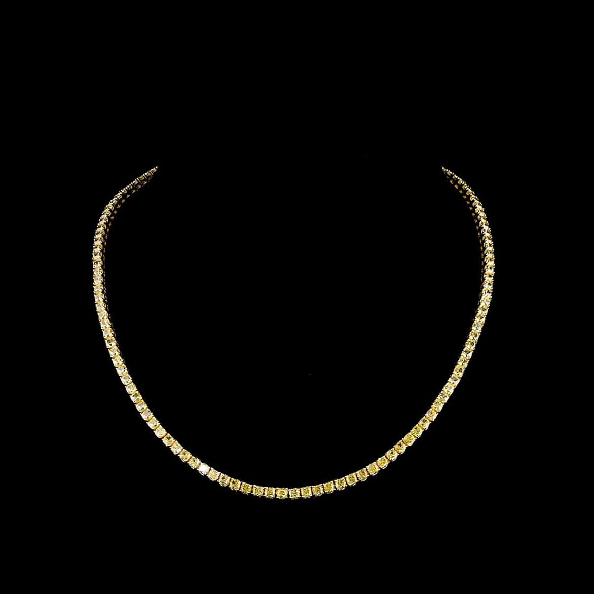 Cushion cut diamond fancy light yellow tennis necklace in yellow gold 3mm front view