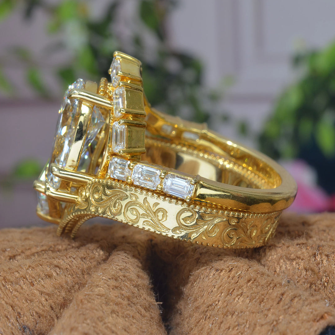 Toi et Moi Emerald & Pear Diamond Bypass Ring with engraving details on shank with curved emerald cut matching band in yellow gold side view
