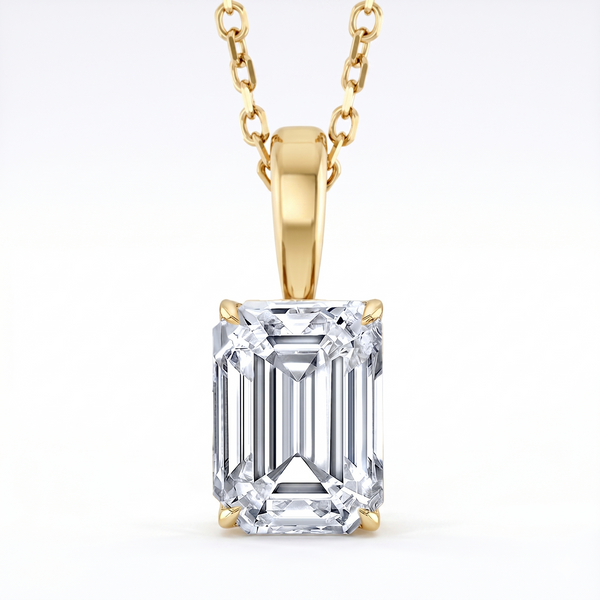 Emerald Cut solitaire Pendant with chain in yellow gold front view