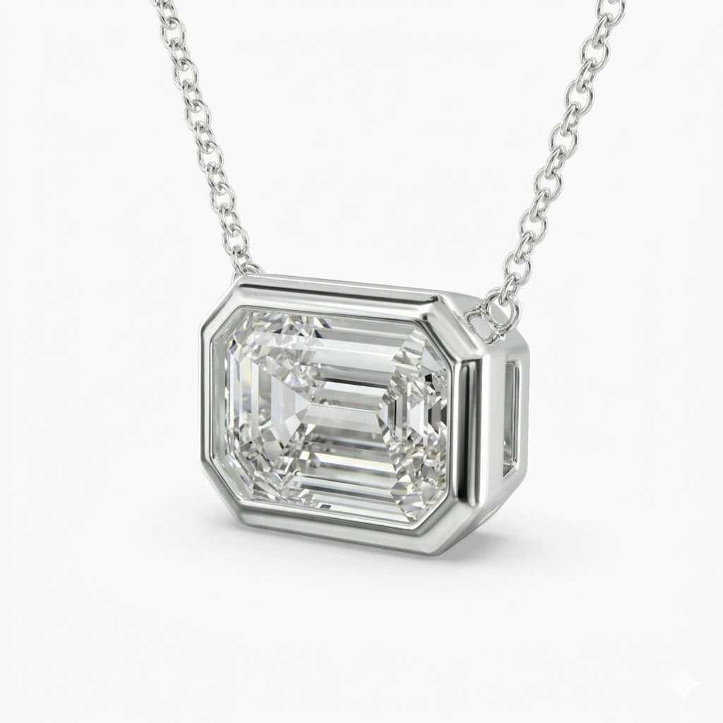 Emerald east west Bezel pendant necklace side profile view 