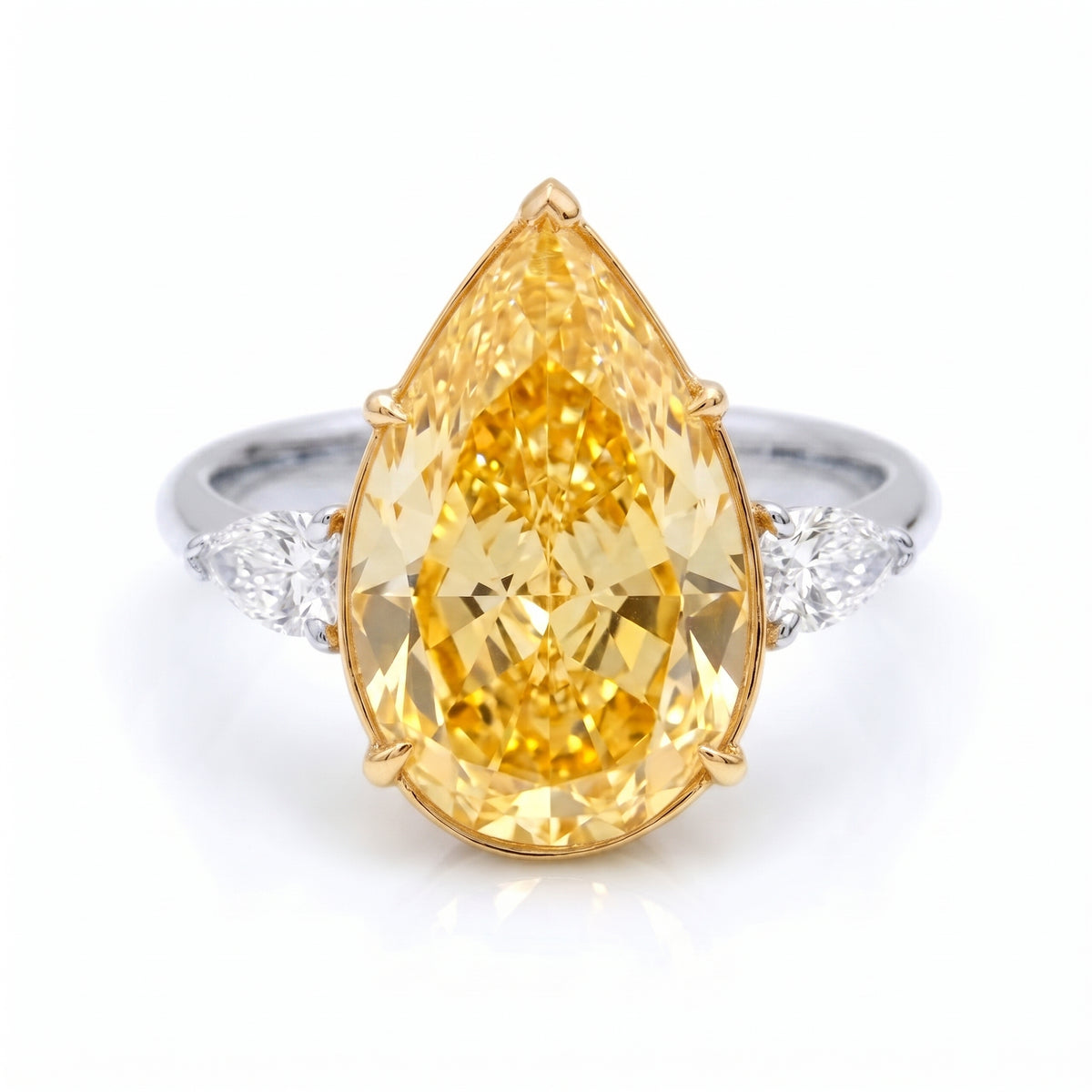 Three stone canary fancy yellow pear cut diamond ring two tone