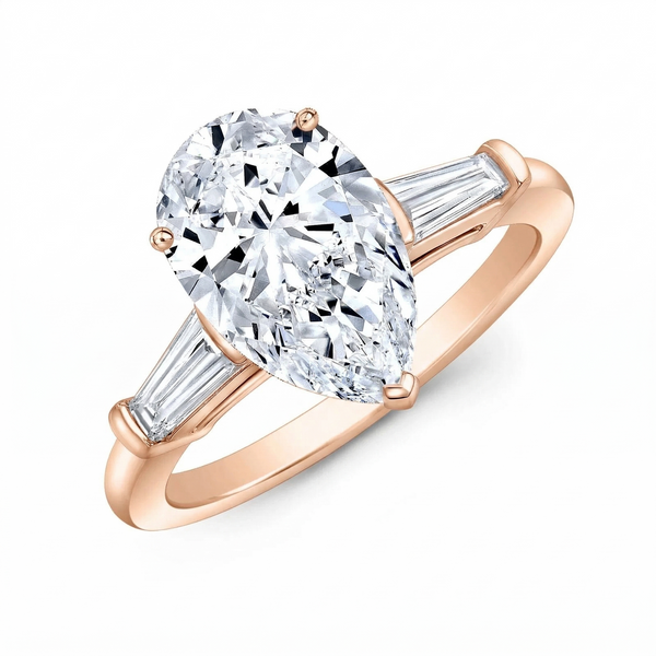 Pear cut diamond center and baguette side in rose gold  