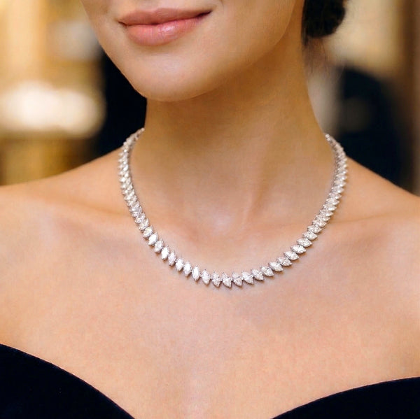 marquise graduated tennis necklace white gold worn by a model