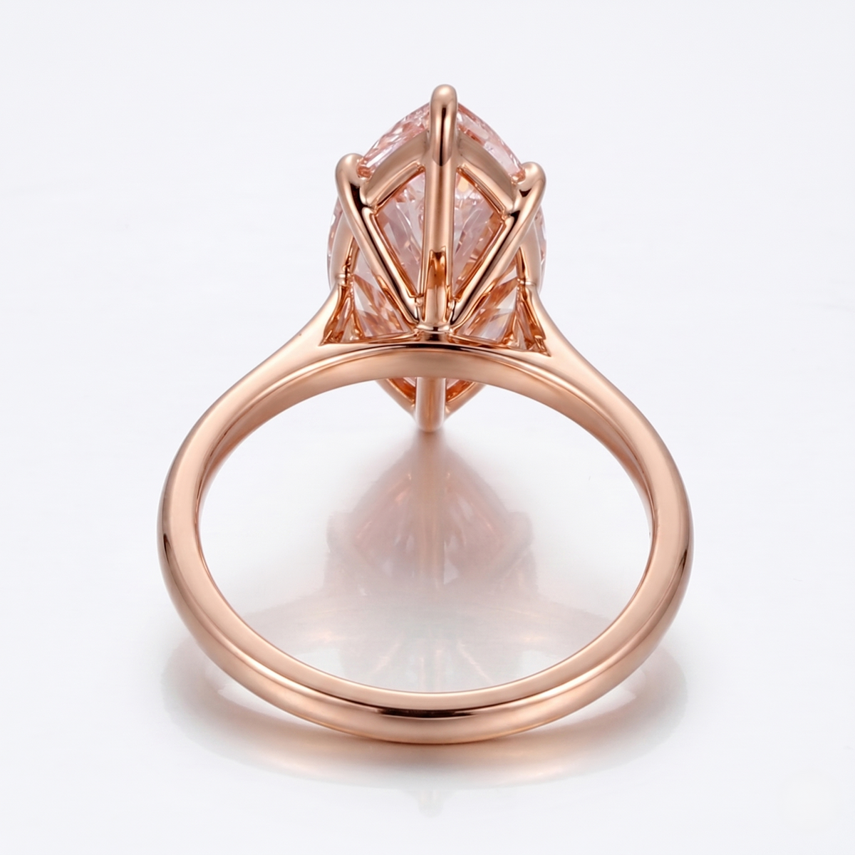 Marquise fancy vivid pink center diamond solitaire ring in rose gold side profile