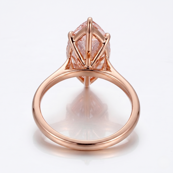 Marquise Fancy vivid pink center diamond solitaire ring in rose gold side profile