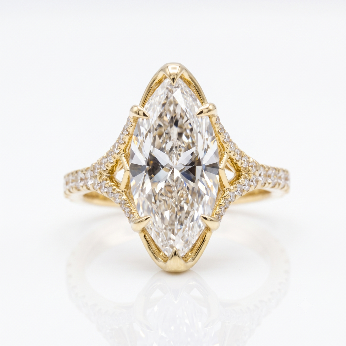 Marquise diamond  round u pave split shank ring in yellow gold top view