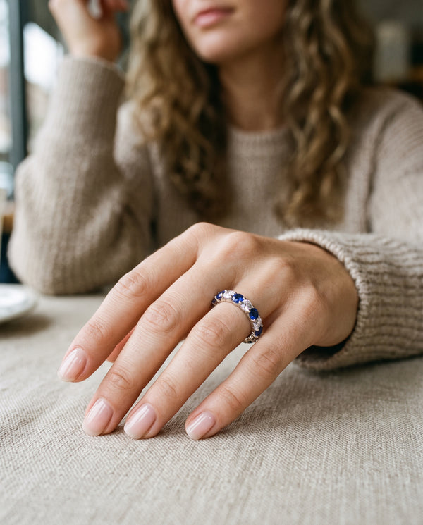 Diamond and Blue Ceylon Sapphire Eternity Ring white gold on model's finger

