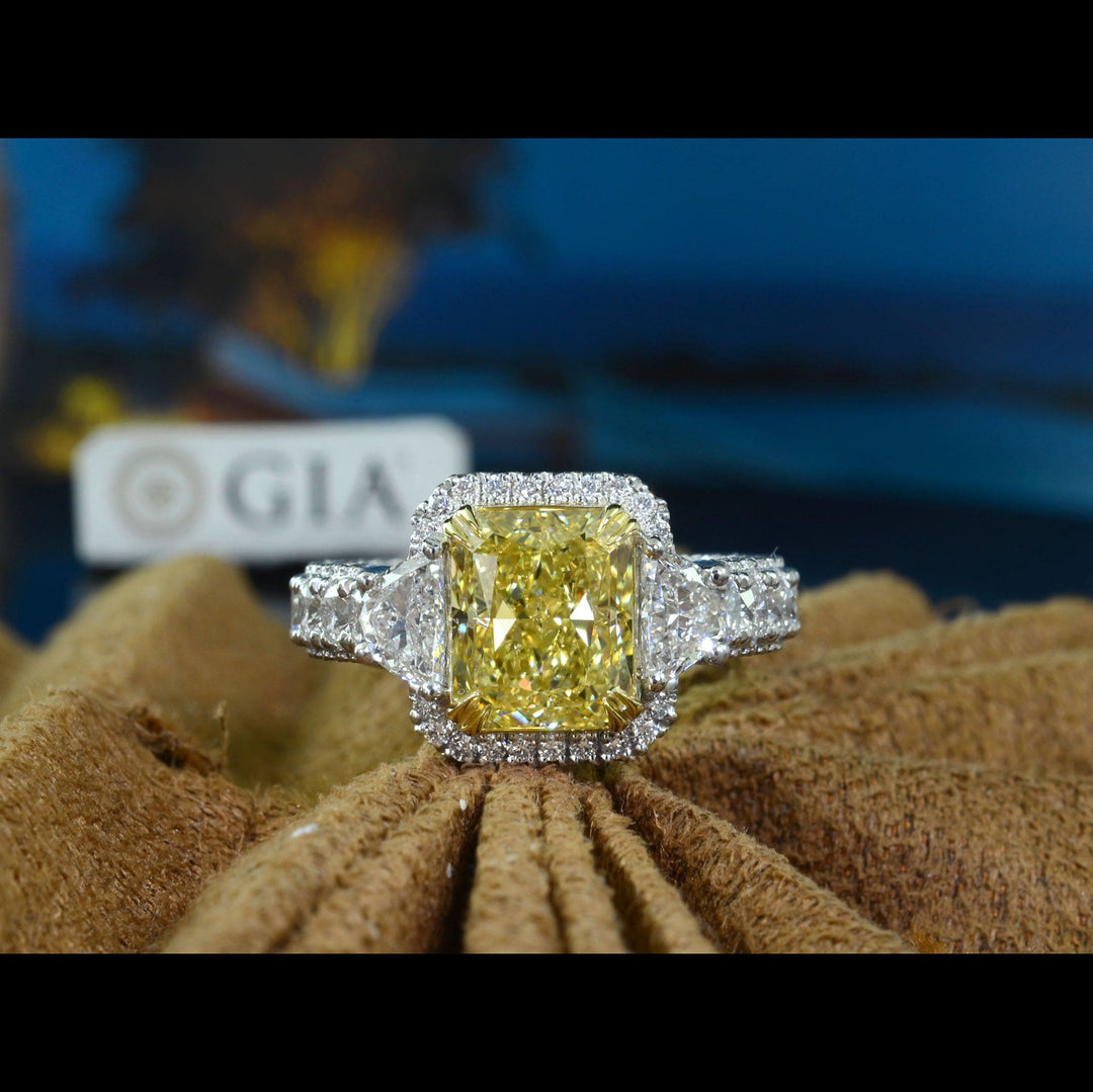 5.5 Ctw Canary Fancy Intense Yellow Elongated Radiant Cut Ring VS1 GIA Certified