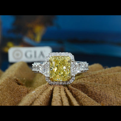 4.5 Ctw Canary Fancy Intense Yellow Elongated Radiant Cut Ring VS1 GIA Certified